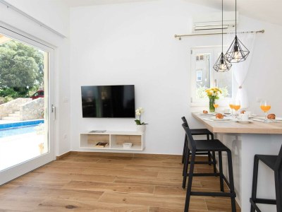 Holiday house IVA with heated pool - Features photo 23