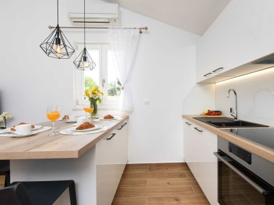 Holiday house IVA with heated pool - Features photo 27