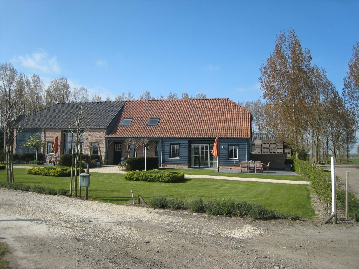 caravan Holiday Home in Zuidzande with Sauna - Outdoor photo 5