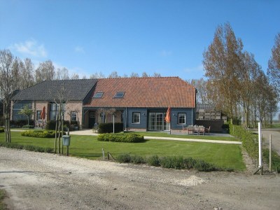 caravan Holiday Home in Zuidzande with Sauna - Outdoor photo 5