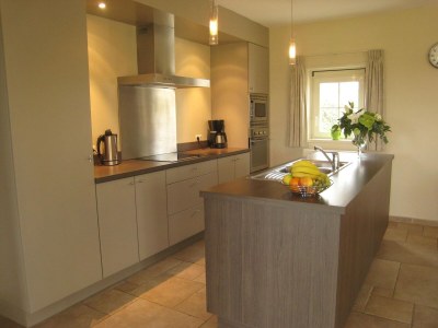 caravan Holiday Home in Zuidzande with Sauna - Features photo 30