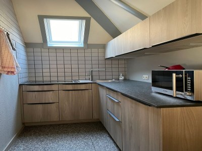 Holiday house Holiday home in Reimboldshausen with balcony - Features photo 11