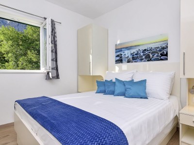 Holiday house Sergio mit Pool und Meerblick - Features photo 24