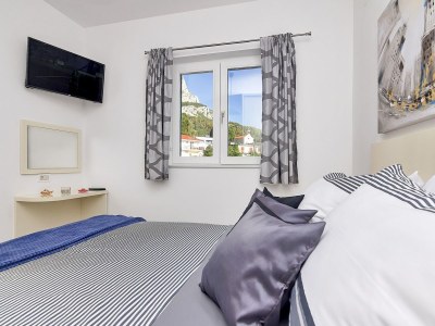 Holiday house Sergio mit Pool und Meerblick - Features photo 28