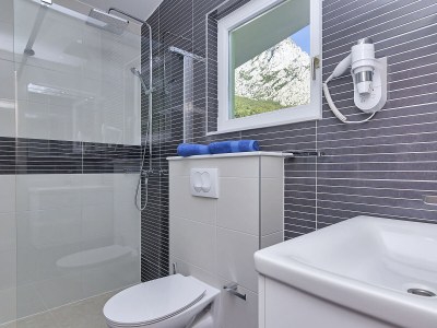 Holiday house Sergio mit Pool und Meerblick - Features photo 29