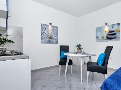 Holiday house Sergio mit Pool und Meerblick - Features photo 32