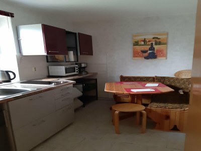 Apartment Sonnige Ferienwohnung am Wald / Büdnerreihe - Features photo 8
