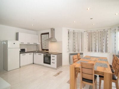 Apartment Apartment Complex Dino - Three-Bedroom Apartment Dino II with Balcony - Features photo 10