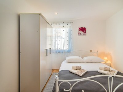 Apartment Apartment Complex Dino - Three-Bedroom Apartment Dino II with Balcony - Features photo 15