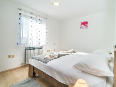 Apartment Apartment Complex Dino - Three-Bedroom Apartment Dino II with Balcony - Features photo 16