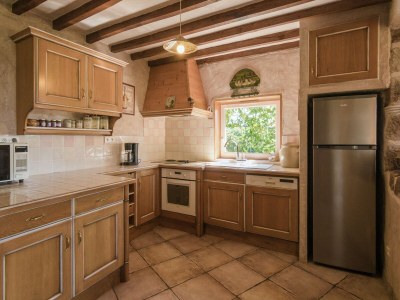 Holiday house Modern holiday home with swimming pool - Features photo 31