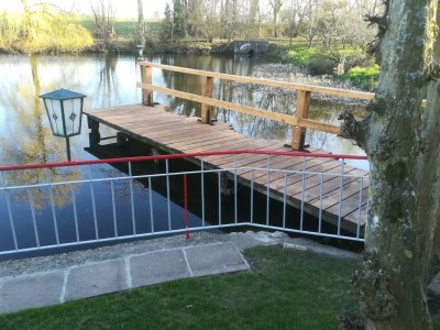 Apartment Vacation Home with Pond - Environment photo 25