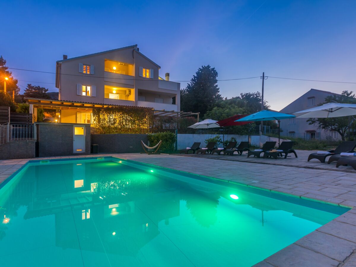 Holiday apartment CLAIRE with large heated pool 50m2 and sea view