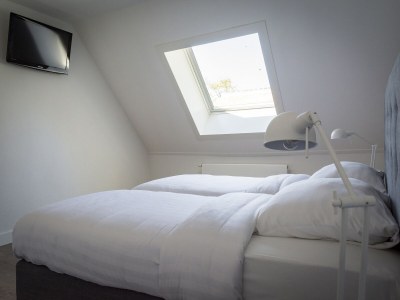 Farmhouse Farmhouse in De Cocksdorp near the Beach - Features photo 15