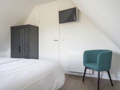 Holiday house Holiday Home in De Cocksdorp near Beach - Features photo 12