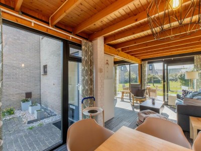 Holiday house Holiday Home near Beach with Pool Access - Features photo 18