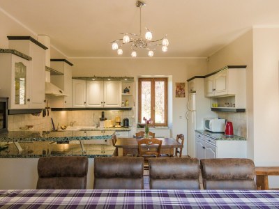 Holiday house Chic holiday home with pool - Features photo 30