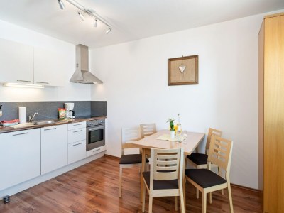 Apartment Apartment in Saalfelden near Ski Slopes - Features photo 16