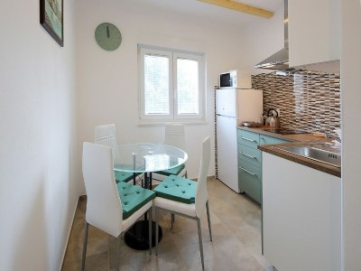 Apartment Apartment in Šilo with Sea View Balcony - Features photo 14