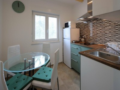 Apartment Apartment in Šilo with Sea View Balcony - Features photo 16