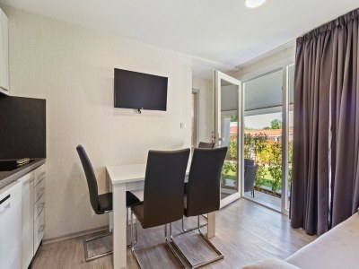 caravan Mobilheim in Banjole nahe Strand - Features photo 26