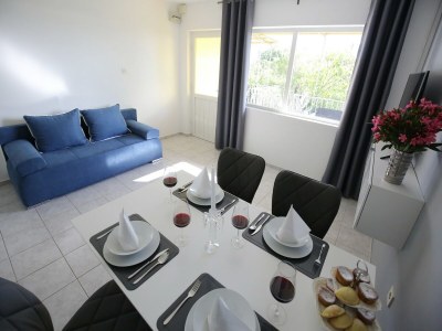 Holiday house Modern holiday home with pool - Features photo 19