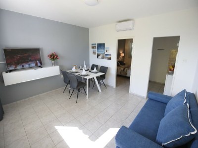 Holiday house Modern holiday home with pool - Features photo 21