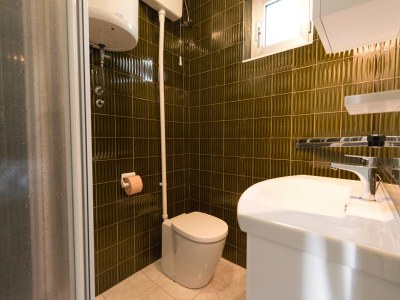 Holiday house Modern holiday home with pool - Features photo 26