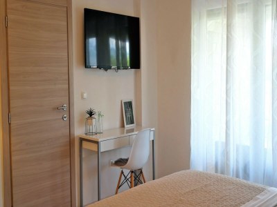 Holiday house Holiday home in center of Šilo near beach - Features photo 24