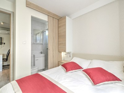 caravan Mobilheim in Banjole nahe Strand - Features photo 22