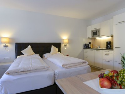 Apartment App. "Kat. I"- Wohn/Schlafraum, Doppelbett-Couch - Features photo 13