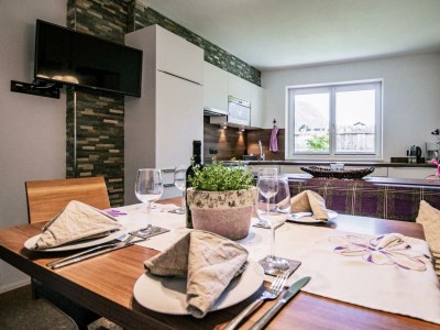 Apartment Appartement mit Garten/ Blick auf die Berge - Features photo 14