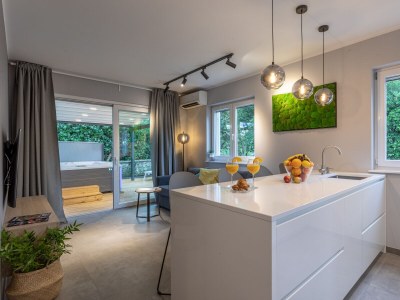 Holiday apartment Ferienwohnung (A2+2) mit Whirlpool im Freien - Features photo 4