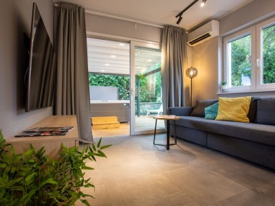 Holiday apartment Ferienwohnung (A2+2) mit Whirlpool im Freien - Features photo 8