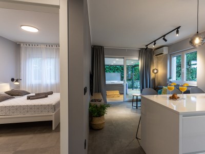 Holiday apartment Ferienwohnung (A2+2) mit Whirlpool im Freien - Features photo 13