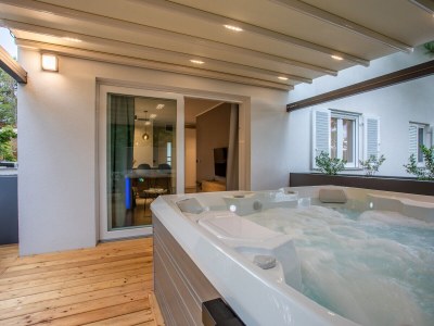 Holiday apartment Ferienwohnung (A2+2) mit Whirlpool im Freien - Features photo 22