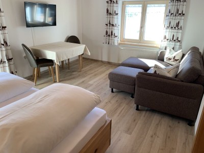 Apartment Apartment - Wohn-Schlafraum  DU/WC  "Typ 5" - Features photo 11