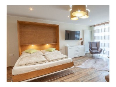 Apartment Kuhstall mit Terrasse und Maarblick für 1-2 Pers. - Features photo 8