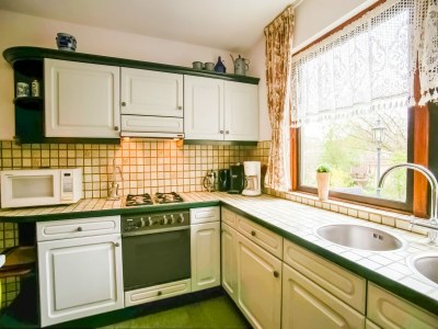 Holiday house Holiday home near the Efteling with garden - Features photo 13