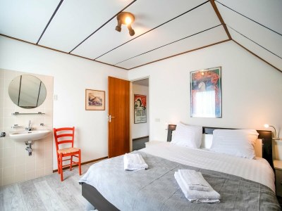 Holiday house Holiday home near the Efteling with garden - Features photo 18