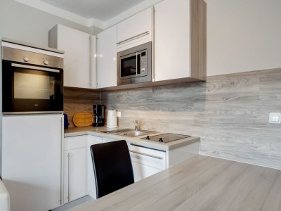 Apartment Gemütlicher Küstenurlaub mit Garten - Features photo 18