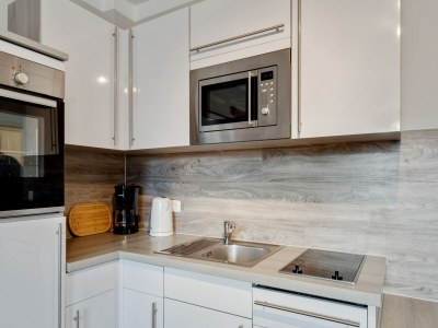 Apartment Gemütlicher Küstenurlaub mit Garten - Features photo 20