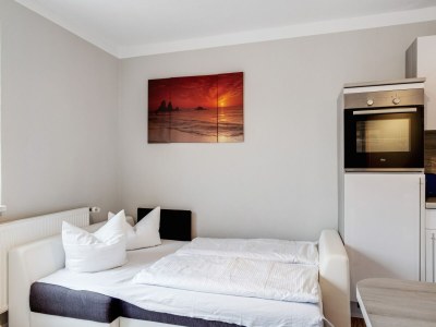 Apartment Gemütlicher Küstenurlaub mit Garten - Features photo 26