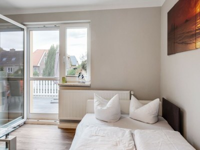 Apartment Gemütlicher Küstenurlaub mit Garten - Features photo 27