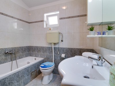 Holiday house Lovely house Piljan - Features photo 32