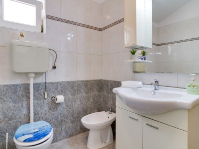 Holiday house Lovely house Piljan - Features photo 33