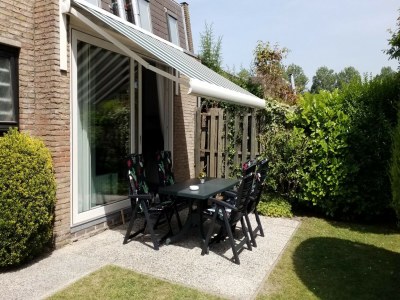 Holiday house Well equipped holiday home in Nieuwvliet, just a few minutes walk from the beach - Outdoor photo 2