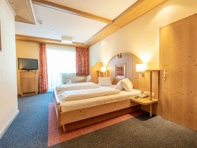 Holiday room Wohn- Schlafzimmer mit Balkon / Halbpension - Features photo 95