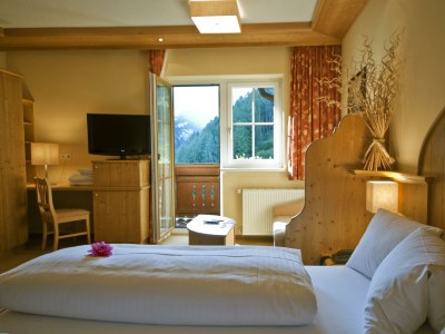 Holiday room Wohn- Schlafzimmer mit Balkon / Halbpension - Features photo 99