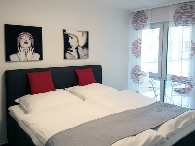 Apartment Komfortable 4-Sterne-Ferienwohnung im Kurviertel - Features photo 32